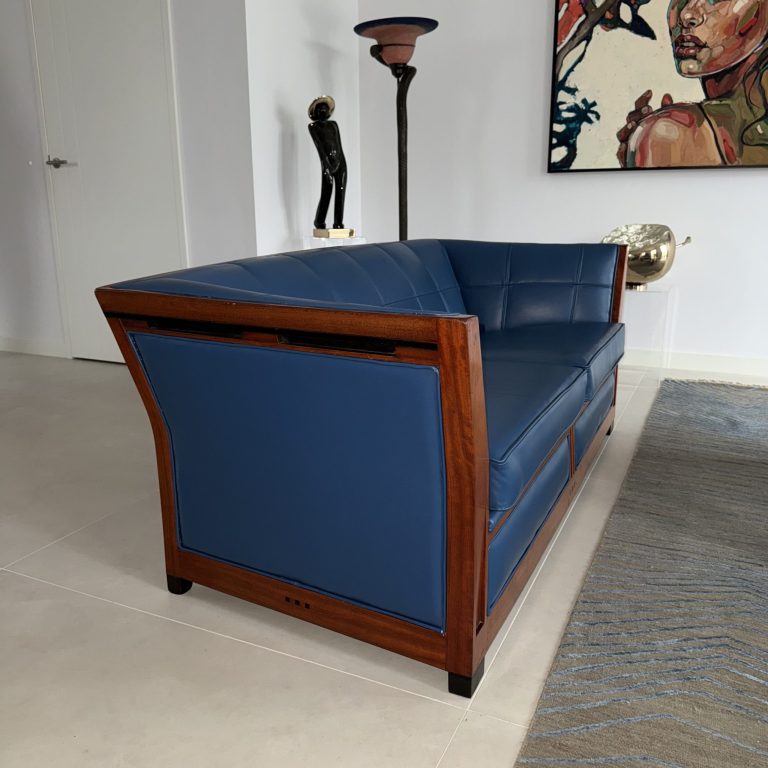 Herstoffering art-deco bank met leer